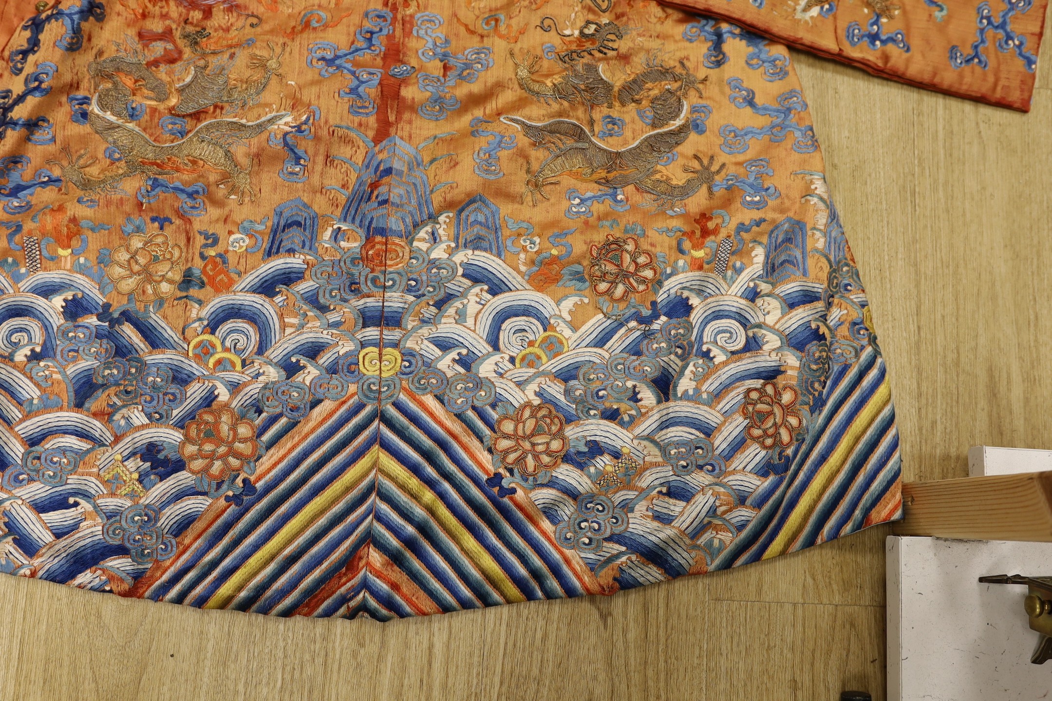 A Chinese embroidered silk dragon robe, late Qing Dynasty